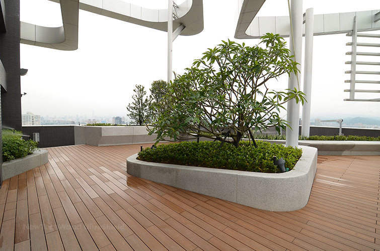 NewTechWood UltraShield Teak decking installed on rooftop terrace.